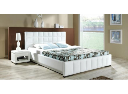 A luxurious designer bed in a sophisticated contemporary style of the highest quality