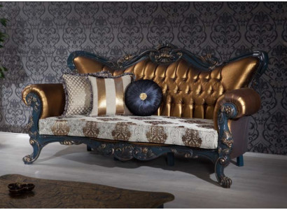 Exquisite sofa in classic style with golden elements for the living room