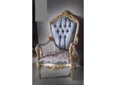 Luxurious armchair in classic style for the living room with golden decorative patterns