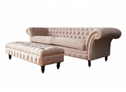 A Luxurious, pink four-seater Chesterfield sofa, INCLUDED seat cushion