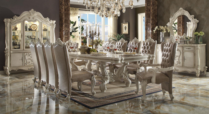 Classic dining room set in antique white. Large dining table with Chesterfield chairs