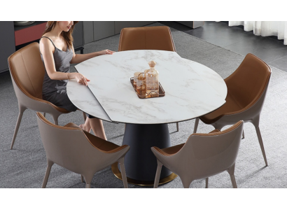 A stylish round dining table for your dining room in a modern style