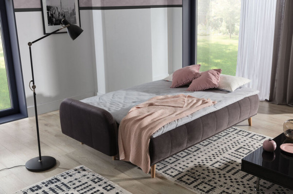 The luxurious large sofa bed is made of high-quality material