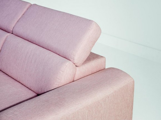 A respectable modern and comfortable 2-seater sofa in a stylish pink color